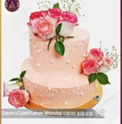 Pleasing Fresh Flowers Two Tier Wedding Cake in Lahore