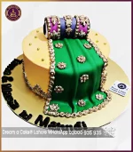 Vibrant Yellow Mehndi Dholak Cake in Lahore