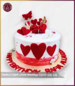 Red Flowers And Butterfly Cake For 3rd Anniversary In Lahore - Image 2