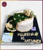 Celebrate Your Mehndi Moments with our Traditional Off-White & Green Mehndi Cake in Lahore