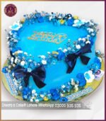 Elegant Blue Floral Birthday Theme Cake in Lahore - Image 3